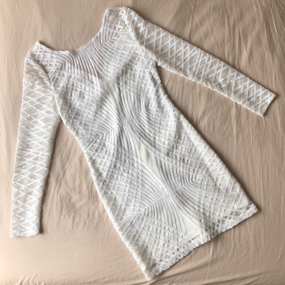 White, long sleeved, mini dress